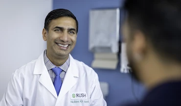 Dr. Batra with a patient