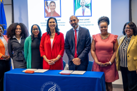 HHS Delegation and REACH signing event with Omar Lateef and Cheryl Campbell