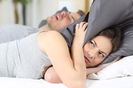 Man's snoring keeps woman awake