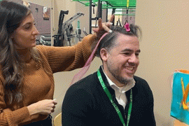 Omar Ramos, program development and operations manager at Waterford Place, got a pink strand in his hair to help raise funds for Waterford Place and awareness of breast cancer.