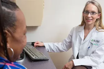 Doctor speaking with patient