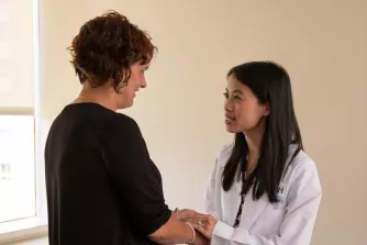 Dr. Audrey Kam with a patient