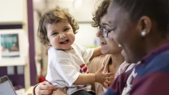 Woman holding a child