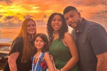 A pictured featured (left to right) Jessica Burgans, Autumn Burgans, Liberty Murray and Billy Burgans, posing with a sunset in the background.