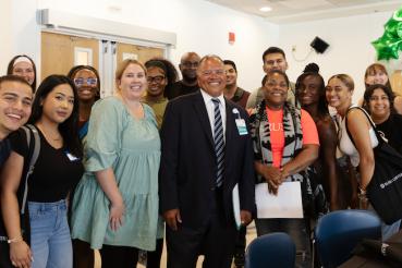 Rush University President Robert S.D. Higgins, MD, MSHA, takes part in a student onboarding fair.