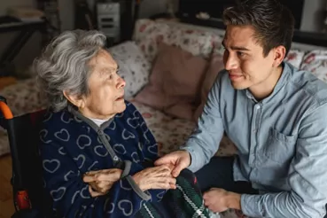 older woman with son who is her caregiver