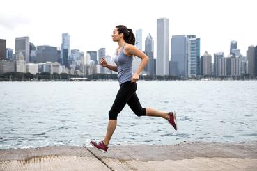 Woman running on Chicago lakefront
