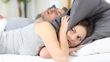 Man's snoring keeps woman awake