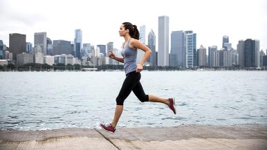 Woman running on Chicago lakefront