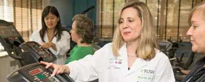 Deborah Hall, MD working with a patient